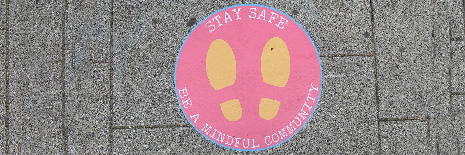 Stay Safe & Be a Mindful Community Floor Sticker outside the Young Vic