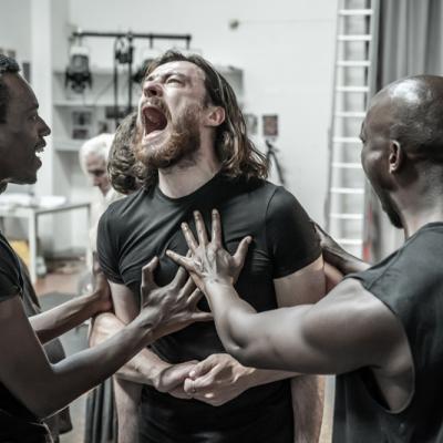 Faaiz Mbelizi, Gavin Drea and Roger Jean Nsengiyumva in rehearsals for Blood Wedding. Young Vic 2019. Photo by Marc Brenner.